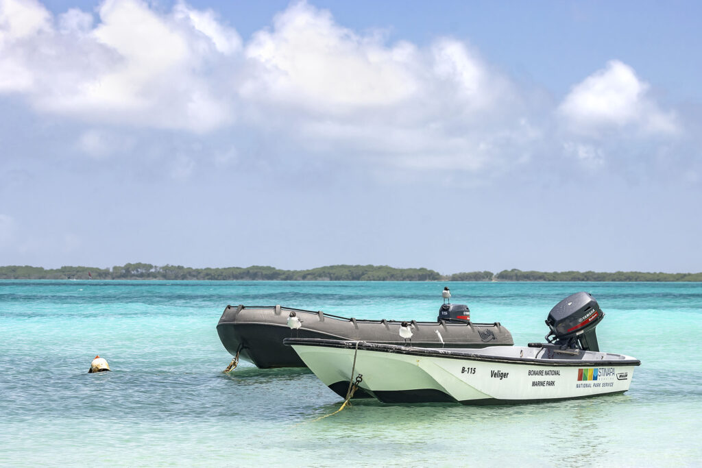 Veliger boat from STINAPA and another boat in the harbor of Lac Cai in Bonaire.