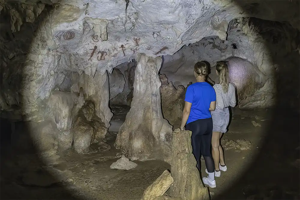 During the "Gems of the East" tour, we visit the Spelonk caves on Bonaire, which feature Indian drawings.